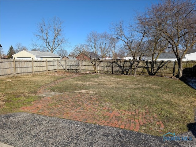 view of yard featuring a fenced backyard