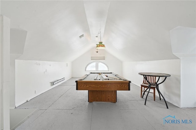 playroom featuring visible vents, concrete floors, and lofted ceiling