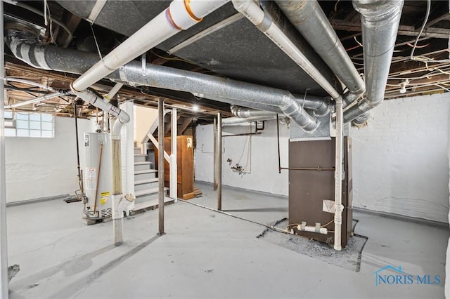 basement with gas water heater, stairway, and heating unit