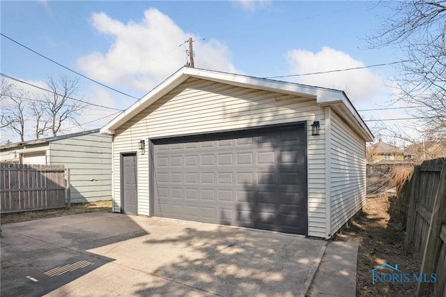 detached garage with fence