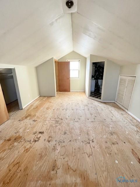 bonus room with lofted ceiling