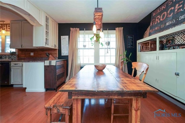 dining area featuring wood finished floors