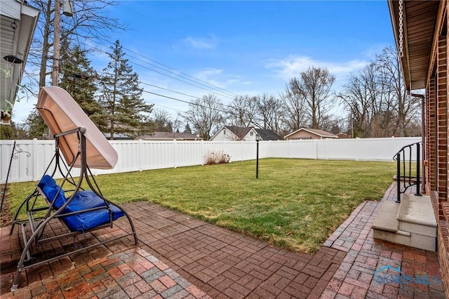 view of yard featuring a fenced backyard and a patio