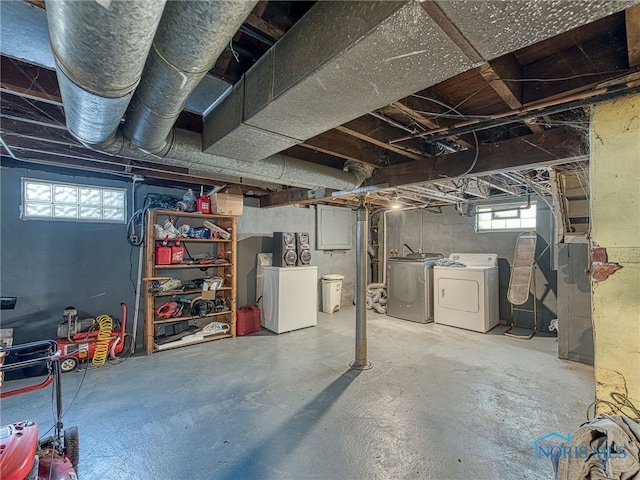 basement with separate washer and dryer