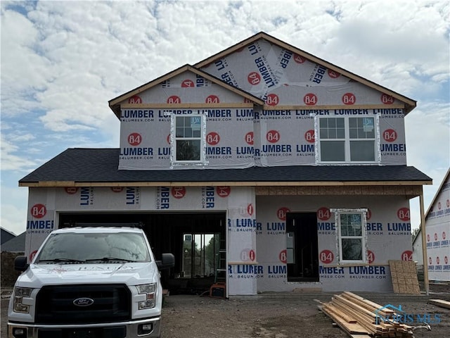 719 W Ironwood Dr, Rossford, OH 43460 - view of front of home with a shingled roof and a garage