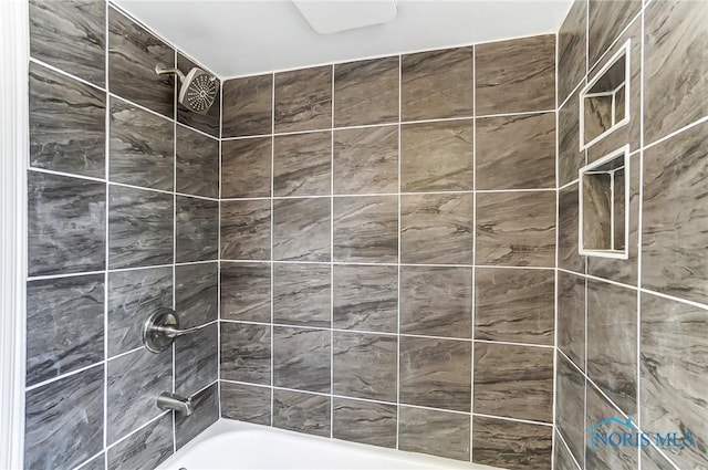 bathroom featuring bathing tub / shower combination