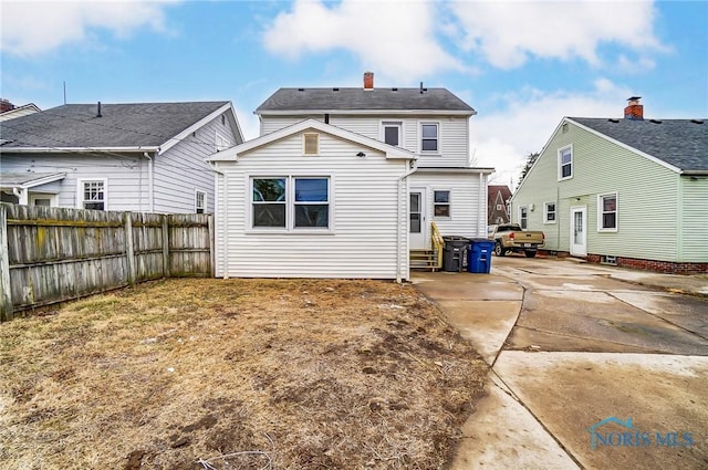 1488 Gould Rd, Toledo, OH 43612 - back of house with fence and entry steps