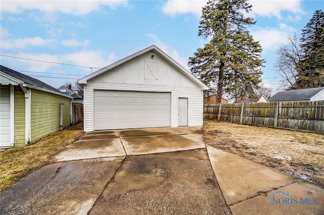 detached garage with fence