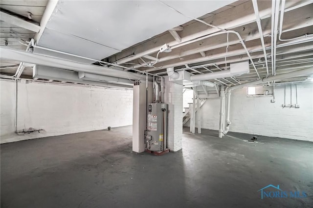 1488 Gould Rd, Toledo, OH 43612 - unfinished basement with gas water heater and stairway