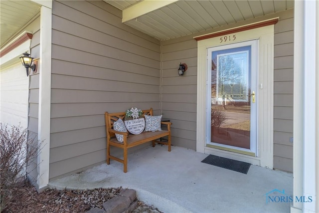 doorway to property with a porch