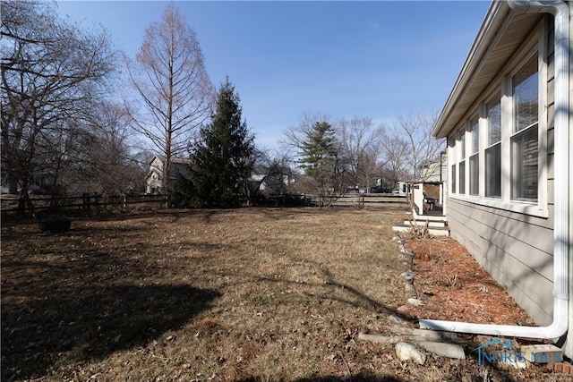 view of yard with fence