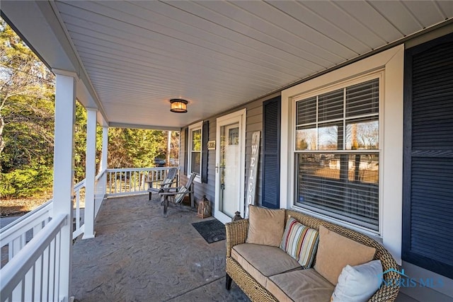 view of patio featuring a porch