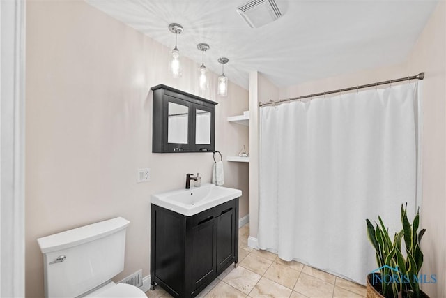 full bathroom featuring visible vents, curtained shower, toilet, tile patterned floors, and vanity