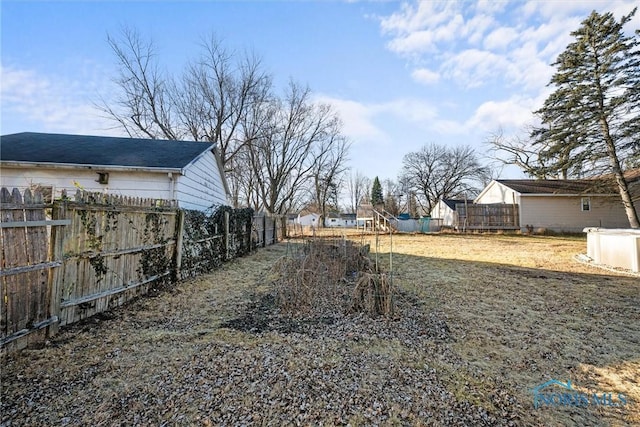 view of yard featuring a fenced backyard