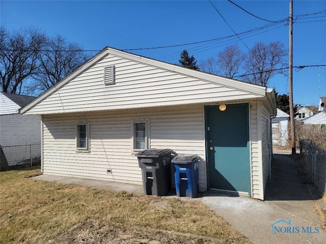 exterior space featuring a yard and fence