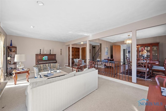2944 Plumbrook Dr, Maumee, OH 43537 - living room featuring carpet floors, stairway, a chandelier, recessed lighting, and baseboards
