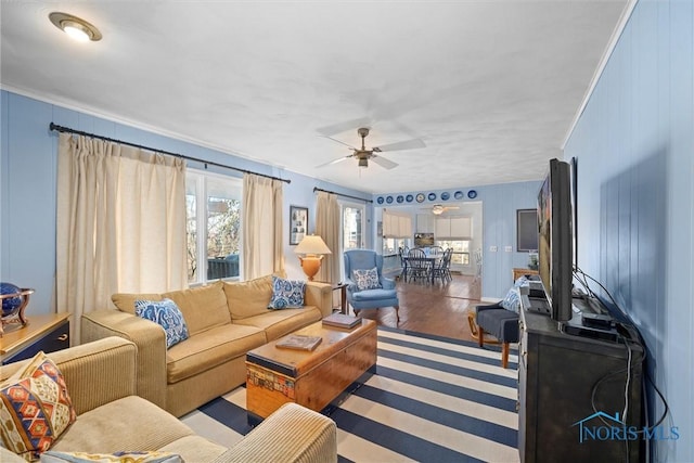 2944 Plumbrook Dr, Maumee, OH 43537 - living area featuring a ceiling fan, wood finished floors, and ornamental molding