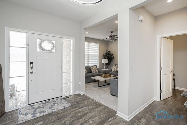 foyer featuring ceiling fan, baseboards, dark wood-style floors, and recessed lighting