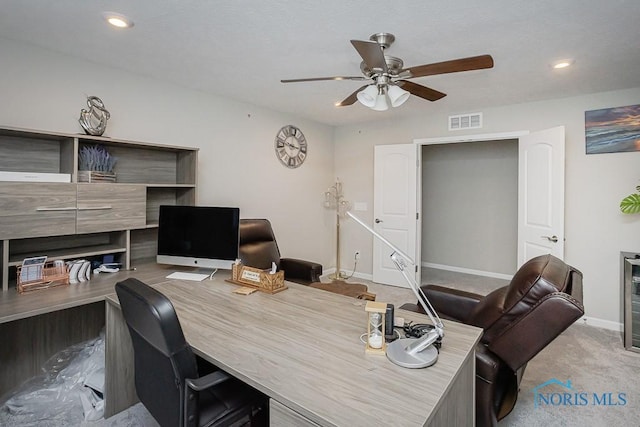 carpeted office with recessed lighting, visible vents, baseboards, and ceiling fan