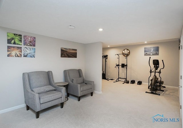 living area with recessed lighting, baseboards, and light carpet