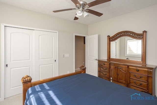 bedroom featuring a closet and ceiling fan