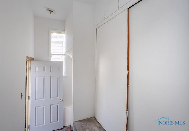 corridor featuring light wood-style flooring