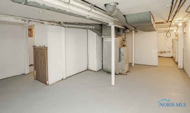 unfinished basement with heating unit