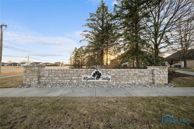 view of community sign