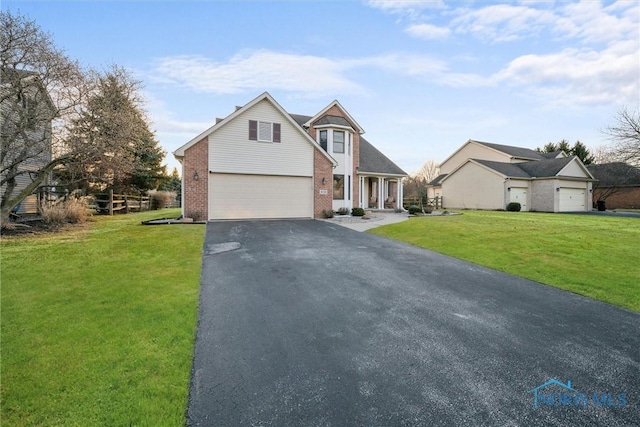 view of front facade featuring brick siding, a garage, a front lawn, and aphalt driveway