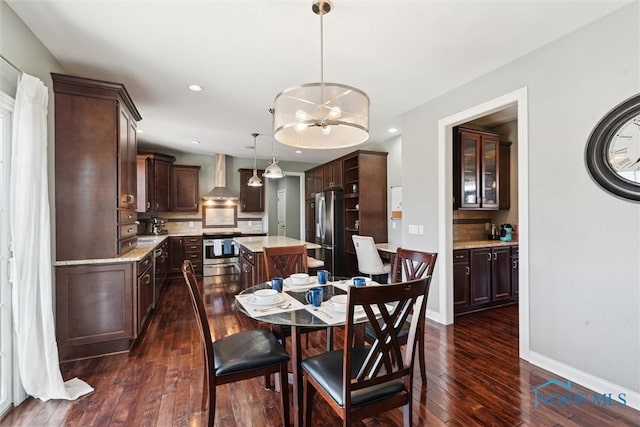 dining room featuring recessed lighting, a chandelier, baseboards, and dark wood-style floors