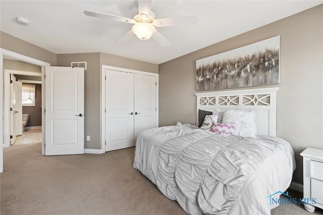 bedroom featuring visible vents, baseboards, carpet, a closet, and a ceiling fan