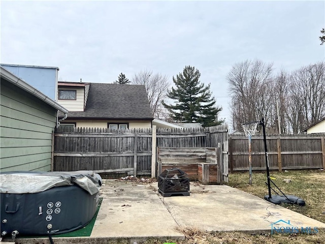 view of patio / terrace featuring fence