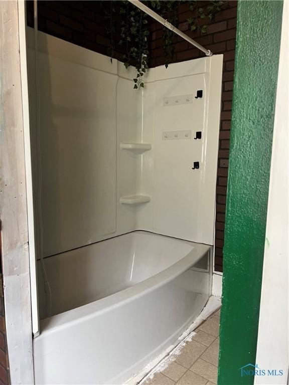 bathroom featuring a tub to relax in and walk in shower