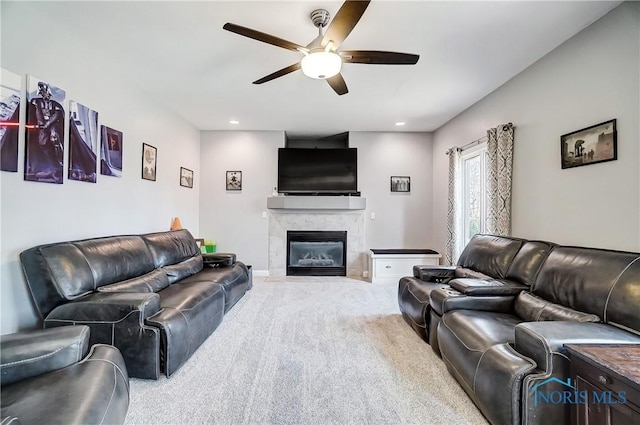 7221 Apache Trl, Holland, OH 43528 - carpeted living room with a ceiling fan, a tiled fireplace, and recessed lighting
