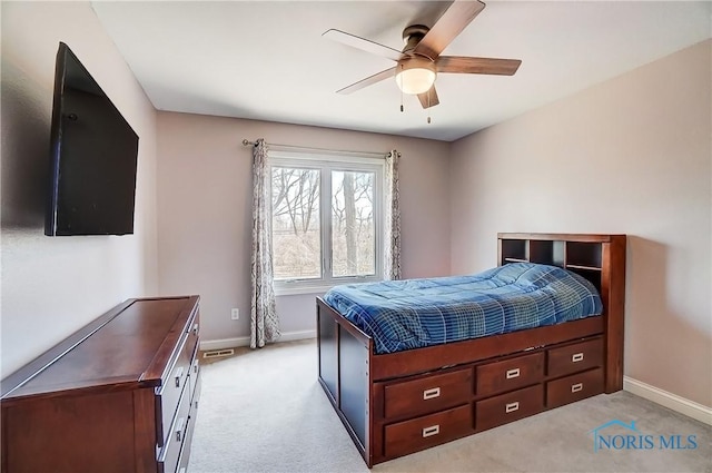 7221 Apache Trl, Holland, OH 43528 - bedroom featuring light carpet, baseboards, and ceiling fan