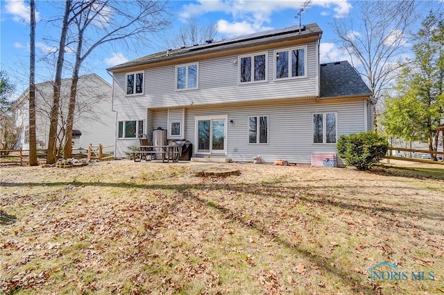 7221 Apache Trl, Holland, OH 43528 - back of house featuring roof mounted solar panels