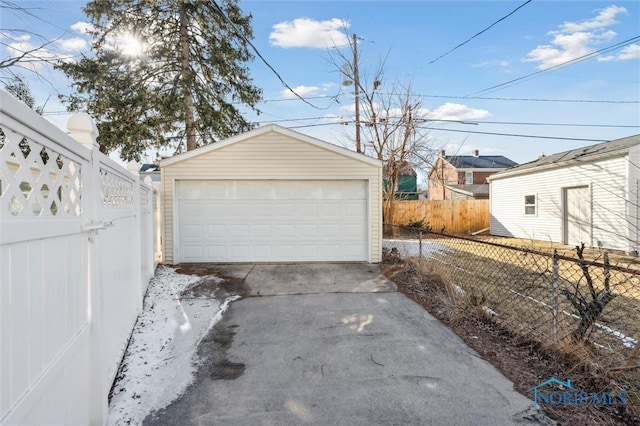 detached garage with fence