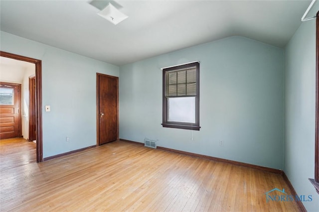 unfurnished bedroom with visible vents, baseboards, a closet, and light wood-style flooring