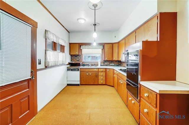 kitchen with a warming drawer, backsplash, white dishwasher, and light countertops