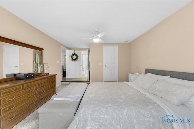 bedroom with visible vents and a ceiling fan