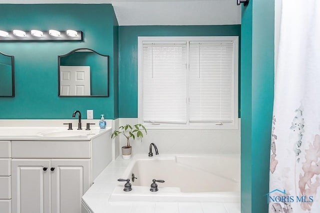 full bathroom with a bath and vanity