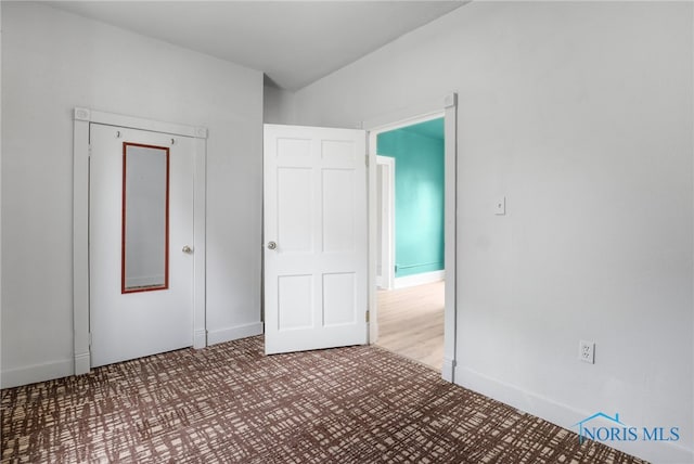 unfurnished bedroom featuring baseboards