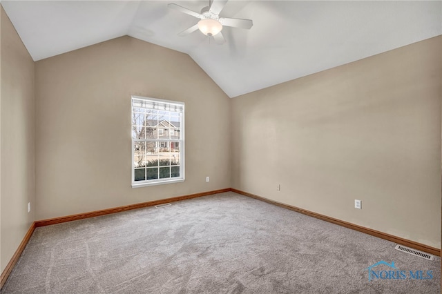 unfurnished room featuring baseboards, visible vents, lofted ceiling, ceiling fan, and carpet flooring