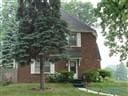 view of front of home featuring a front lawn