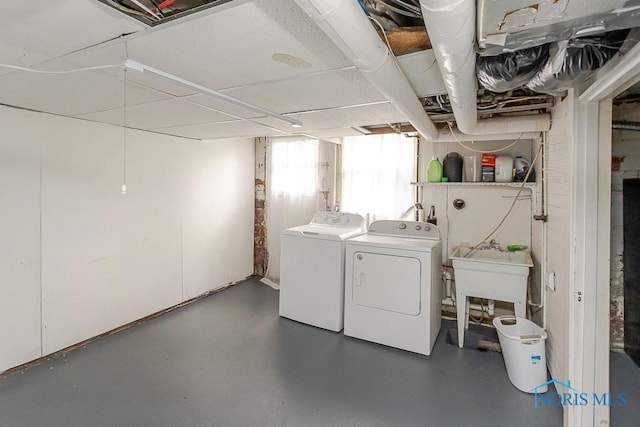 121 Eagle Point Dr, Rossford, OH 43460 - basement featuring washing machine and dryer and a sink