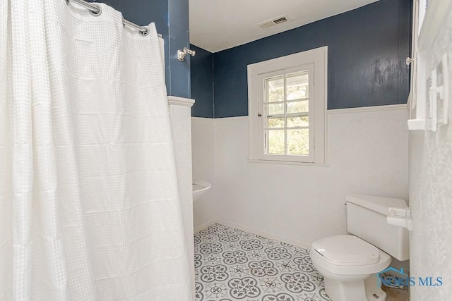 121 Eagle Point Dr, Rossford, OH 43460 - bathroom with toilet and tile patterned floors