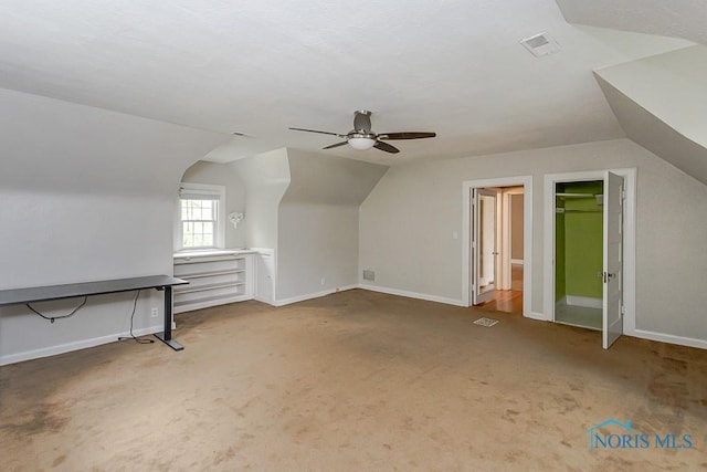 121 Eagle Point Dr, Rossford, OH 43460 - bonus room featuring vaulted ceiling, ceiling fan, carpet, and baseboards