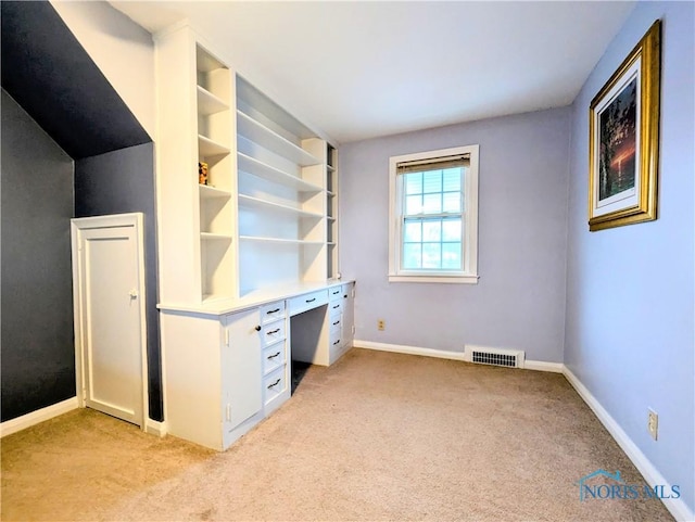 509 Oakwood Ave, Bryan, OH 43506 - unfurnished office with baseboards, visible vents, and light colored carpet