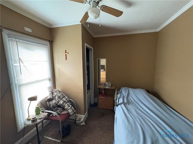 bedroom with baseboards, carpet, ornamental molding, and a ceiling fan