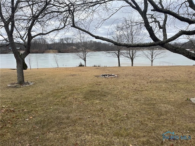 view of yard with a water view